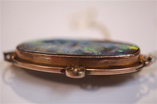 An Edwardian 9ct gold and black opal brooch, 51mm.